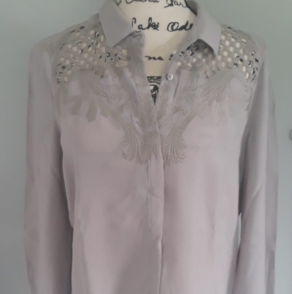 Pale "silky" blouse with rich embroidery